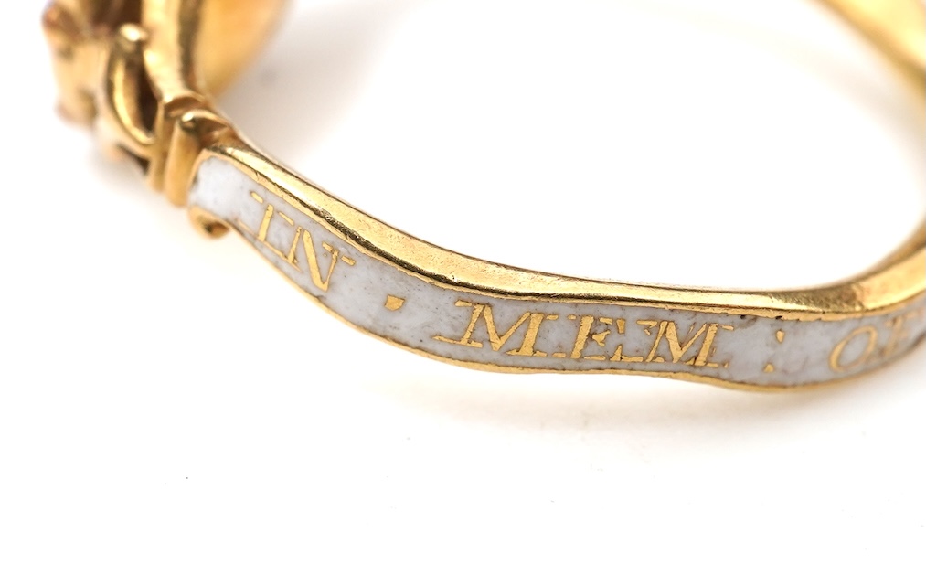 A rare and unusual George III amethyst and enamel mourning ring, late 18th century